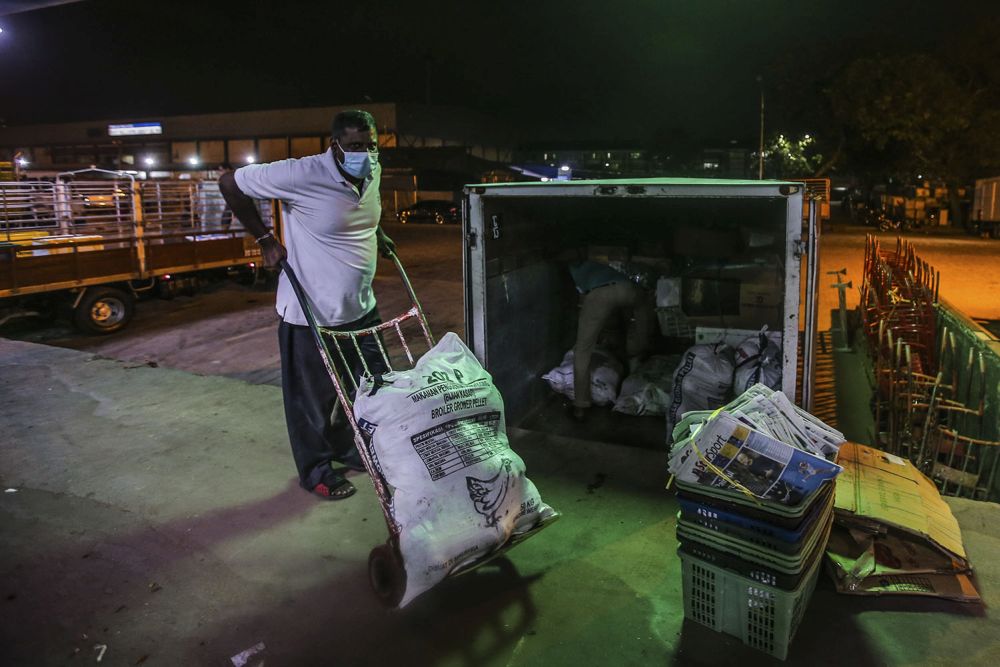 A general view of the Kuala Lumpur wholesale market as traders resume business after the enhanced movement control order on the area was lifted on May 13, 2020. — Picture by Hari Anggara