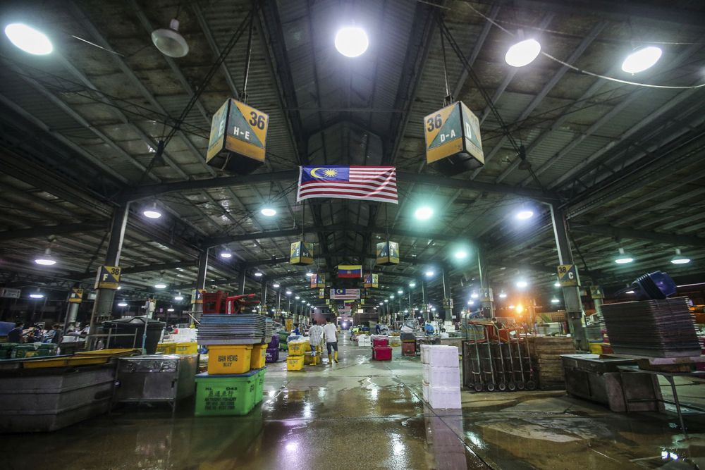 A general view of the Kuala Lumpur Wholesale Market as traders resumed business after the enhanced movement control order on the area was lifted on May 13, 2020. — Picture by Hari Anggara