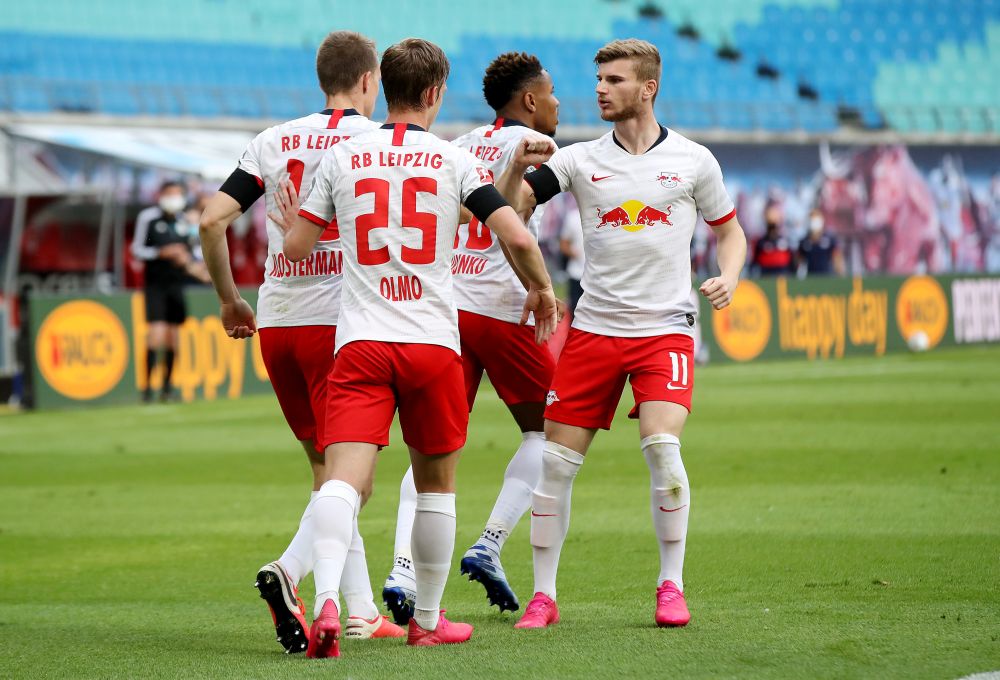 RB Leipzig's Lukas Klostermann celebrates scoring their first goal against Hertha BSC with Timo Werner and Dani Olmo at the Red Bull Arena, Leipzig May 27, 2020. u00e2u20acu201d Reuters pic