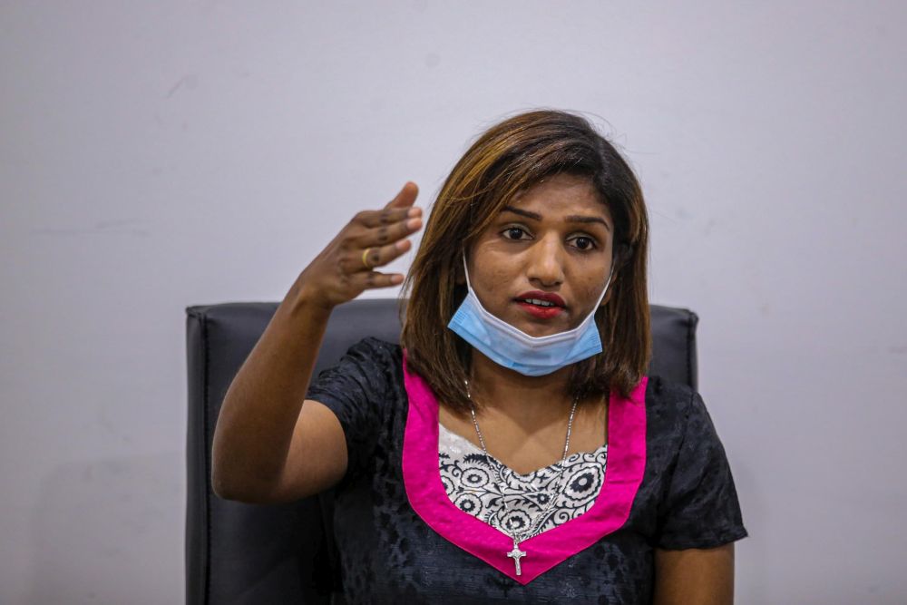 Single mother Lisa Christina speaks to reporters during a press conference at Pusat Khidmat Rakyat Parliament Batu, Kuala Lumpur May 7, 2020. u00e2u20acu201d Picture by Hari Anggara