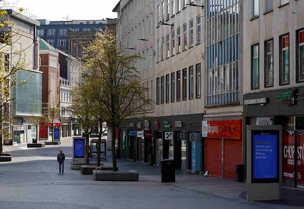 People walk through an empty shopping area in Liverpool, Britain April 19, 2020. u00e2u20acu201d Reuters pic