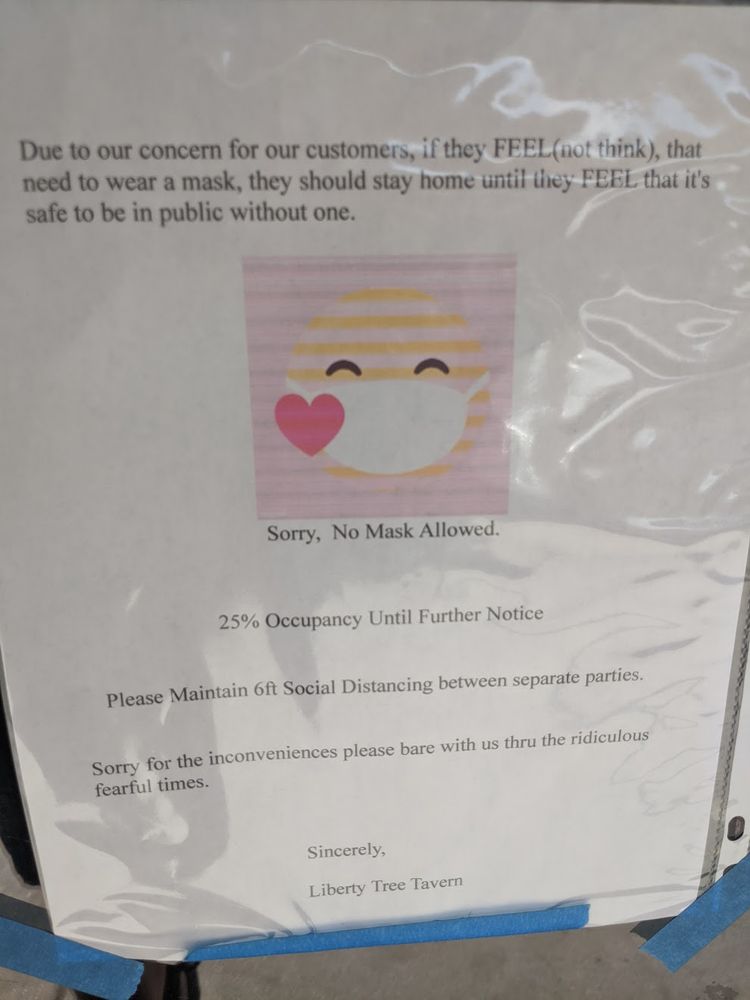 American restaurant, Liberty Tree Tavern posted a notice prohibiting customers from donning their face masks. — Picture via Facebook/BrettanyBoozer