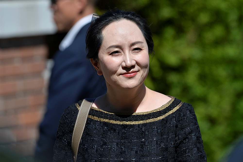 Huawei Technologies Chief Financial Officer Meng Wanzhou smiles as she leaves her home to attend a court hearing in Vancouver, British Columbia, Canada May 27, 2020. u00e2u20acu201d Reuters pic