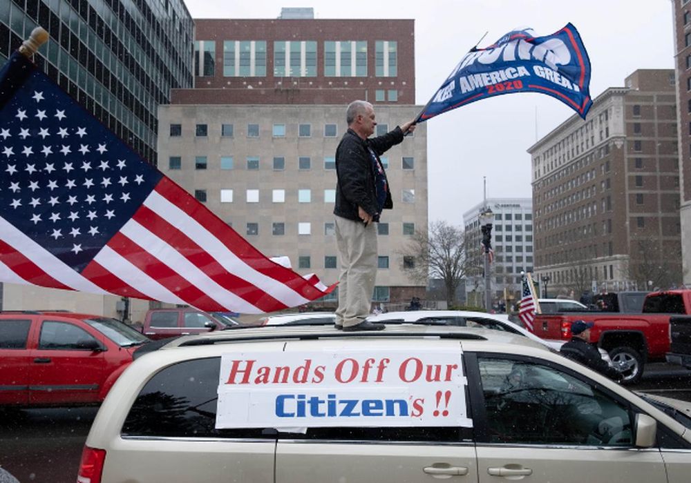 Supporters of the Michigan Conservative Coalition protest against the stateu00e2u20acu2122s extended stay-at-home order, amid the spread of the coronavirus disease, at the Capitol building in Lansing, Michigan, US April 15, 2020. u00e2u20acu201d Reuters pic