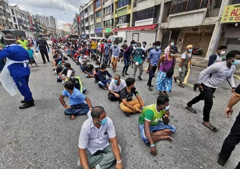 A total of 1,368 illegal immigrants including children were detained by the Immigration Department in raids carried out at the Selayang Wholesale Market, May 12, 2020. u00e2u20acu201d Picture courtesy of Twitter/TV Bernama
