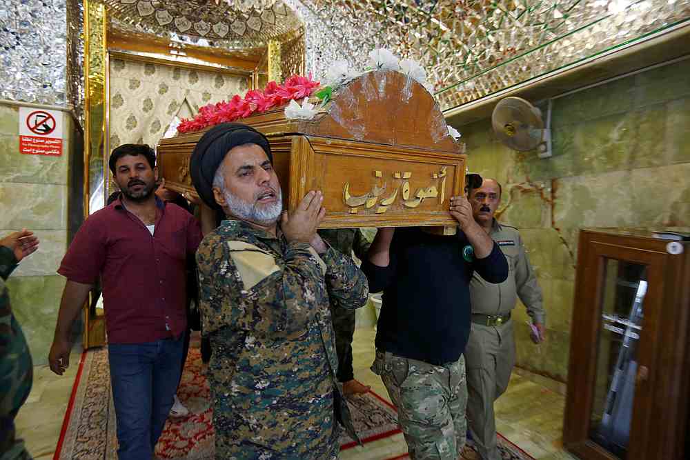 Mourners carry the coffin of a member of Popular Mobilisation Forces, who was killed in clashes with Islamic State militants in Salahuddin province, during the funeral Najaf, Iraq May 3, 2020. u00e2u20acu201d Reuters pic