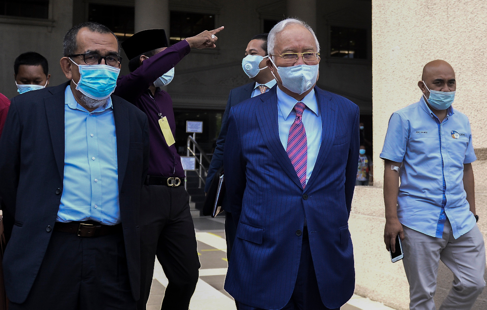 Datuk Seri Najib Razak leaves Kuala Lumpur High Court after his 1MDB trial May 19, 2020. u00e2u20acu201d Picture by Miera Zulyana