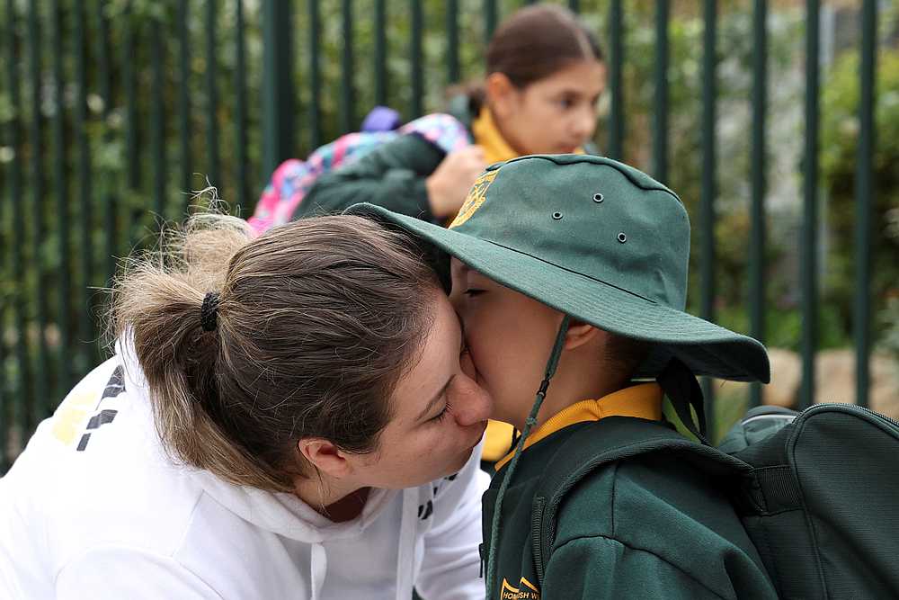 Children return for the first day of public schools fully re-opening for all students and staff, amid easing of Covid-19 restrictions at Homebush West Public School in Sydney, Australia May 25, 2020 u00e2u20acu201d Reuters pic