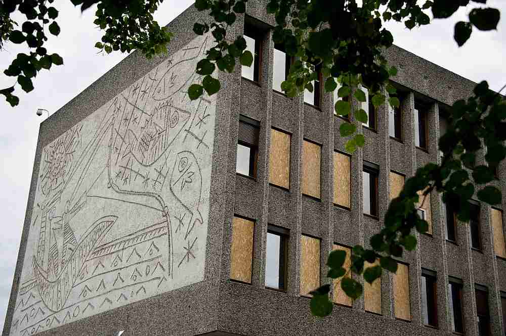 Windows are boarded up on the government quarter's 'Y' building with Picasso's mural art work 'The Fisherman' in Oslo, Norway. u00e2u20acu201d AFP pic