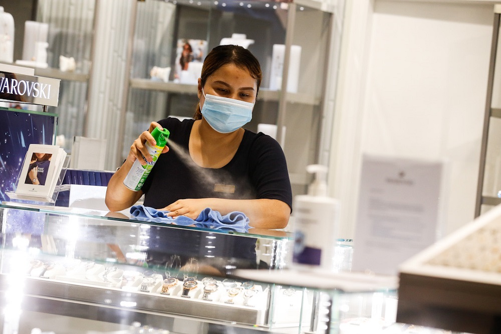 A salesperson sanitises her work area at a shop in Gurney Paragon, George Town May 8, 2020. ― Picture by Sayuti Zainudin