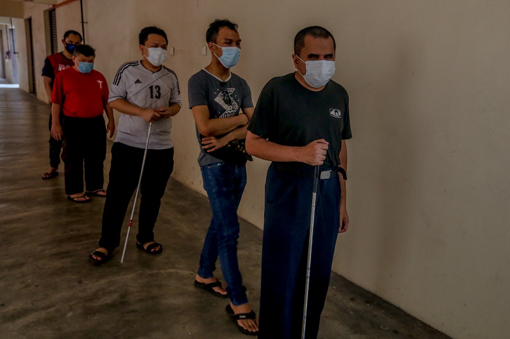 The blind community who live at PPR Lembah Subang 2, May 23, 2020. u00e2u20acu2022 Picture by Firdaus Latif