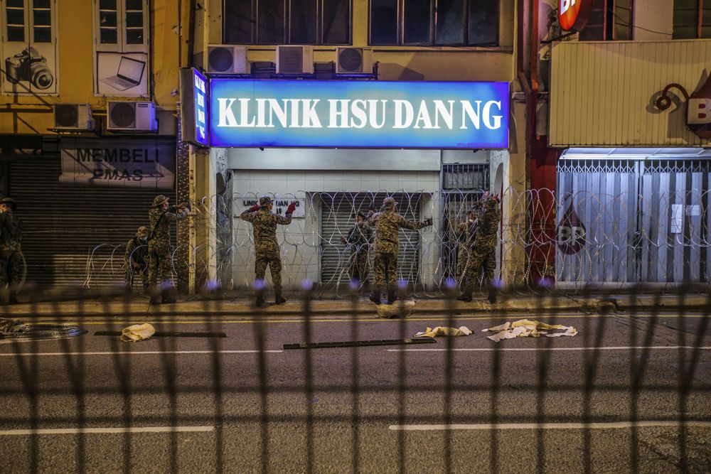 Armed Forces personnel erect barbed wire fencing in Pudu, Kuala Lumpur May 15, 2020. u00e2u20acu201d Picture by Hari Anggarann