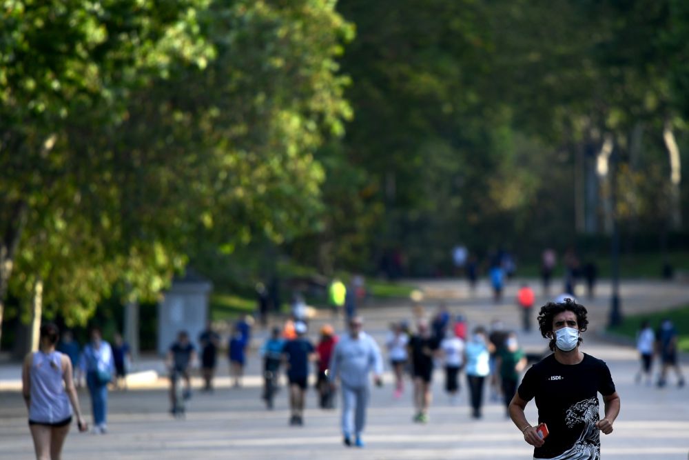 People exercise at the Retiro Park in Madrid. u00e2u20acu201d AFP picnn