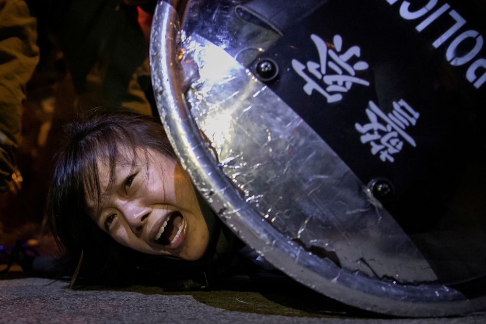 An anti-extradition bill protester is detained by riot police outside Mong Kok police station in Hong Kong September 2, 2019. Reuters has been awarded the 2020 Pulitzer Prize in Breaking News Photography for Hong Kong protests. u00e2u20acu201d Reuters pic