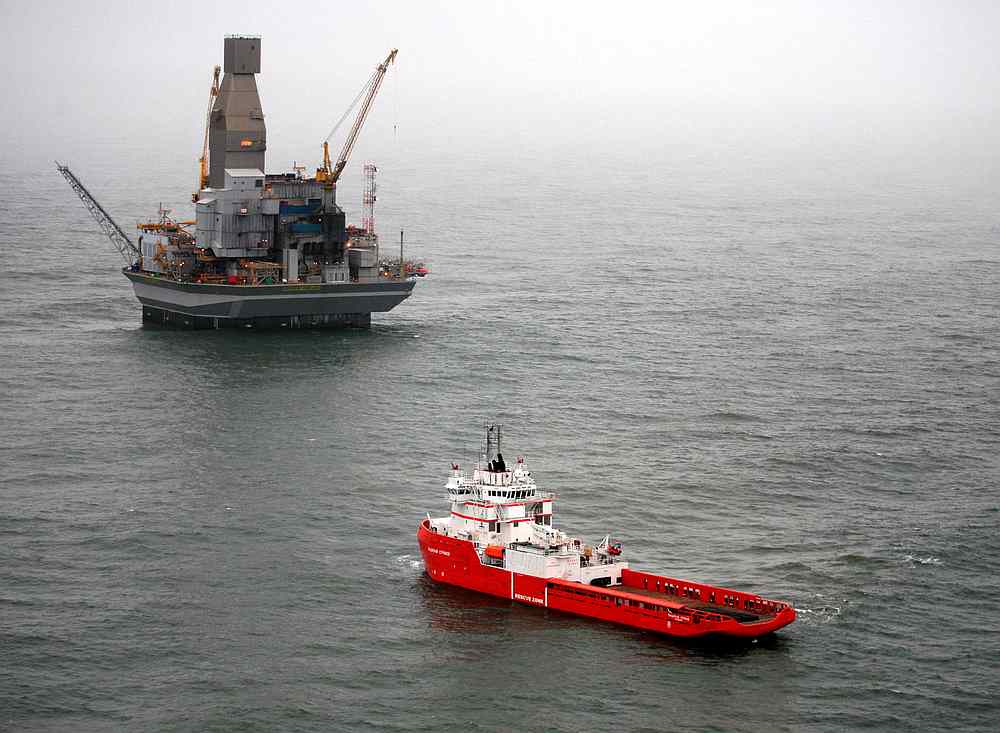 A vessel leaves the Orlan oil plattform at Sakhalin-1's offshore rig at the Chaivo field, some 11 km  off the east cost of Sakhalin island October 10, 2006. u00e2u20acu201d Reuters pic 