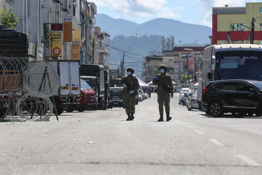 Armed Forces personnel patrol the vicinity of Selayang Baru amid the enhanced movement control order May 14, 2020. u00e2u20acu201d Picture by Yusof Mat Isa