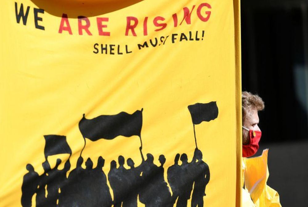 A banner is pictured during a demonstration outside of the Shell headquarters, as the spread of the coronavirus disease (Covid-19) continues, in The Hague, Netherlands, May 19, 2020. u00e2u20acu201d Reuters pic
