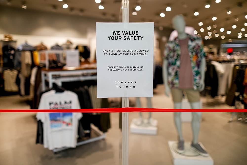 A reminder of safety precautions is posted outside a branch of UK clothing brand TOPSHOP inside the SM Mall of Asia, in Pasay City, Metro Manila, Philippines May 27, 2020. u00e2u20acu201d Reuters pic