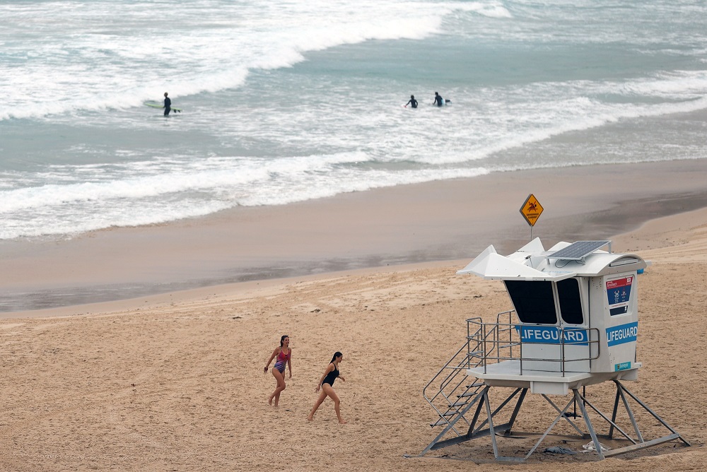Women walk in Bondi Beach amidst the easing of coronavirus disease restrictions in Sydney May 15, 2020. u00e2u20acu2022 Reuters pic