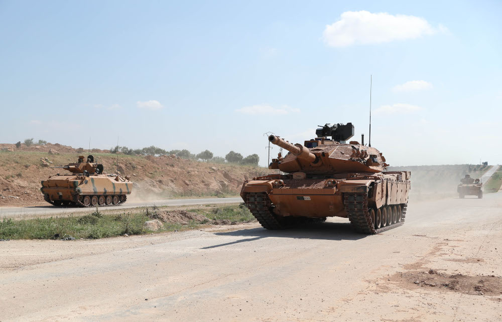 Turkish military tanks drive past the town of Ariha on the M4 highway in Syriau00e2u20acu2122s rebel-held north-western Idlib province May 7, 2020. u00e2u20acu201d AFP pic 