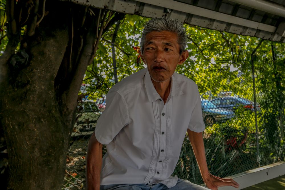 Taxi driver Yee Kee Chong speaks to Malay Mail at the Taman Maluri LRT station May 4, 2020. — Picture by Firdaus Latif