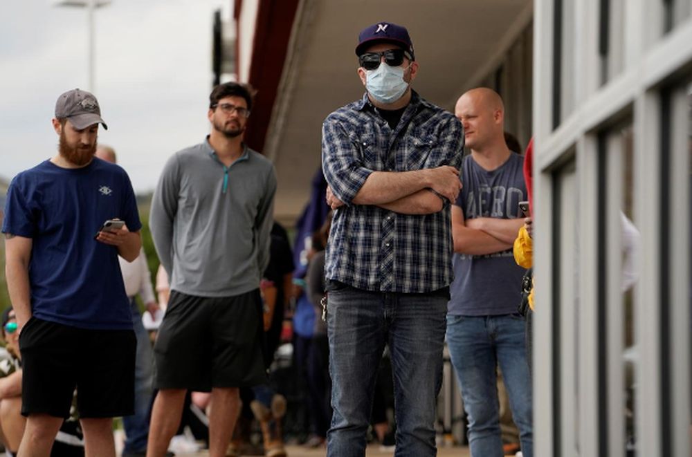 People who lost their jobs wait in line to file for unemployment following an outbreak of the coronavirus disease (Covid-19), at an Arkansas Workforce Center in Fayetteville, Arkansas, US, April 6, 2020. u00e2u20acu201d Reuters pic