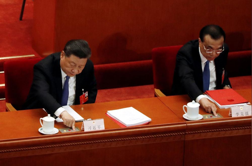 Chinese President Xi Jinping and Premier Li Keqiang cast their votes on the national security legislation for Hong Kong Special Administrative Region at the closing session of the National Peopleu00e2u20acu2122s Congress in Beijing, May 28, 2020. u00e2u20acu201d Reuters pic