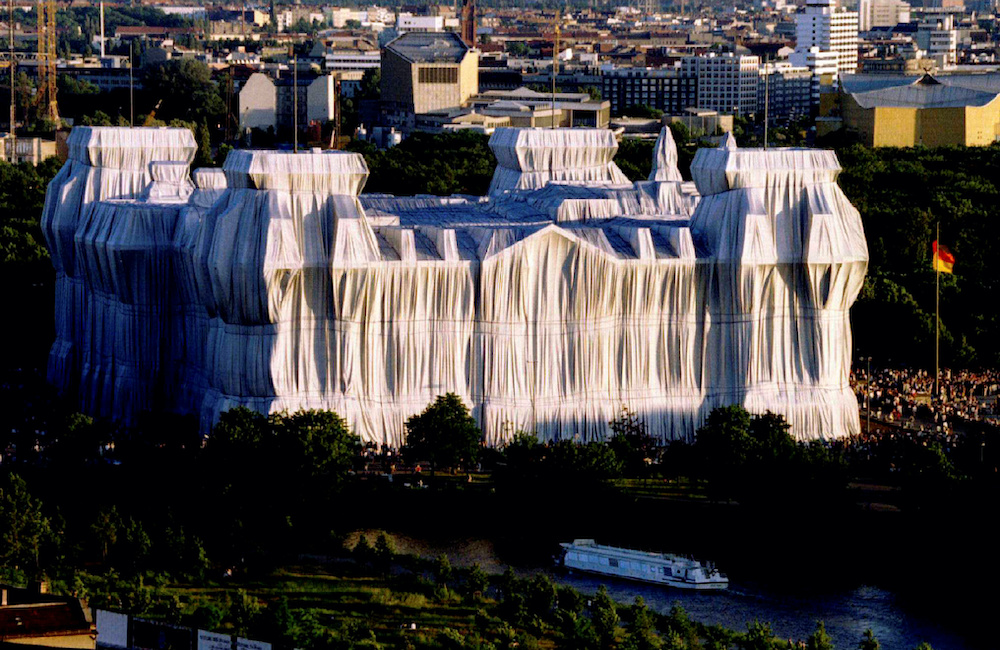 The sunset illuminates the German Reichstag wrapped with silver polypropylene fabric, during the ‘Wrapped Reichstag’ project by conceptual artists Christo and Jeanne Claude, Berlin, Germany, June 25, 1995. — Reuters pic