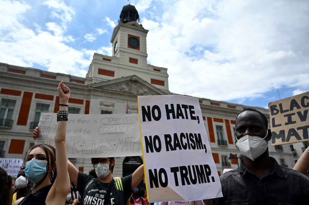 Protesters raise their fists at the Puerta del Sol square in Madrid during a demonstration against racism and in solidarity with the Black Lives Matter movement, in the wake of the killing of George Floyd, June 7, 2020. u00e2u20acu201d  AFP pic