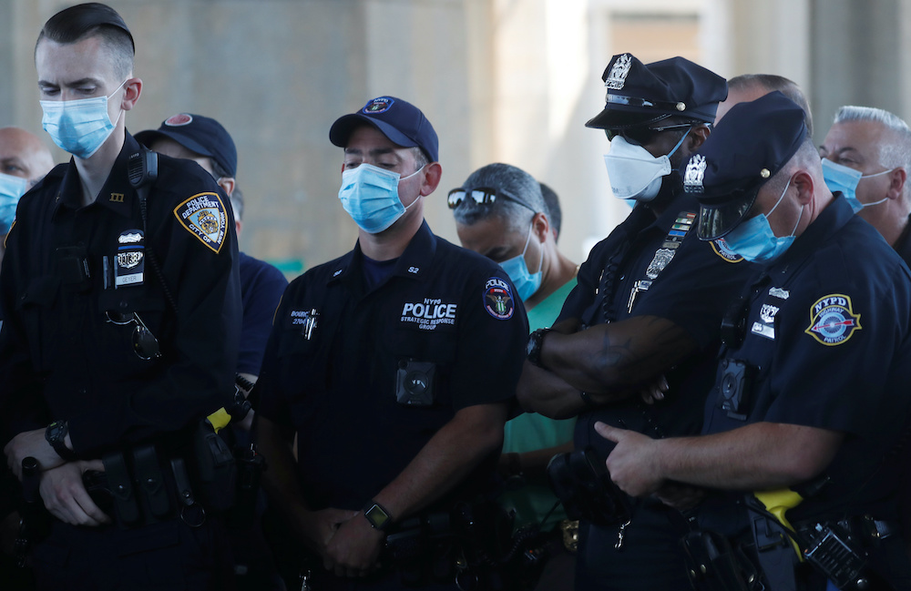 Uniformed officers wear protective face masks at a news conference in New York City June 9, 2020. u00e2u20acu201d Reuters pic