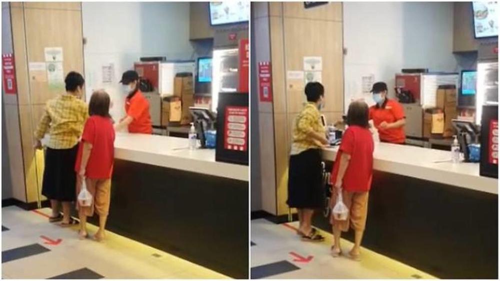 In a video circulating online, a female customer was filmed hurling verbal abuse at a KFC staff member. She was then seen spitting at the employee before walking off. u00e2u20acu201d Social media picture via TODAY