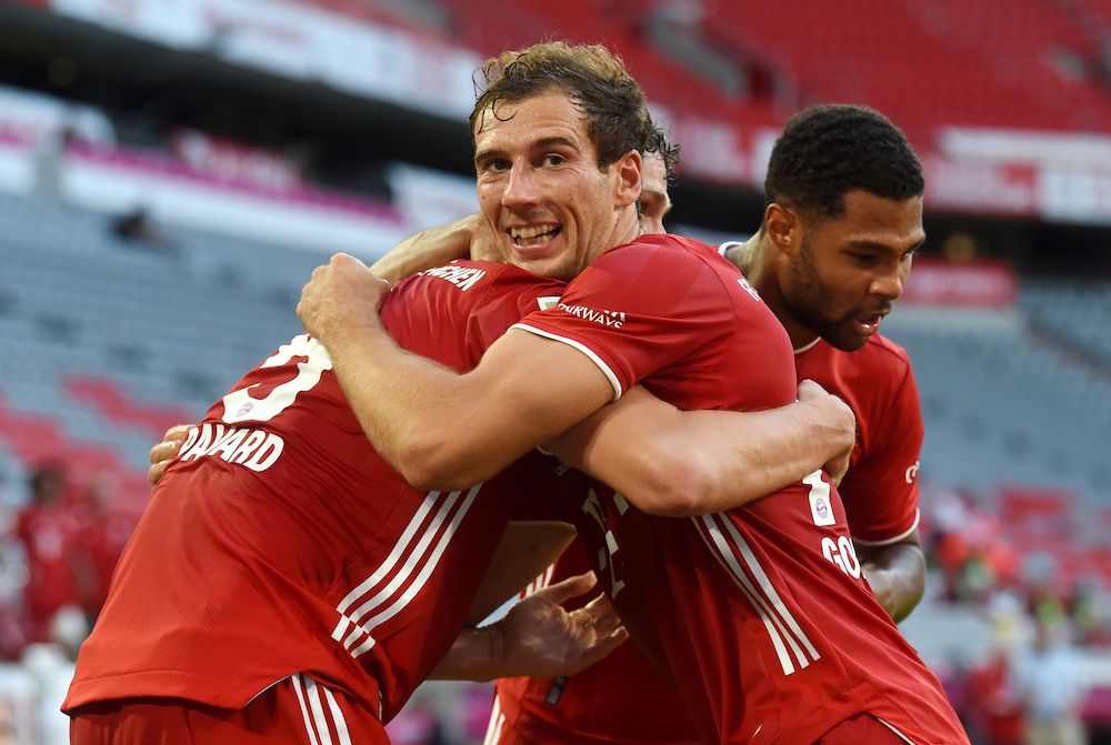 Bayern Munich's Leon Goretzka celebrates scoring their second goal with teammates, as play resumes behind closed doors in Munich, Germany June 13, 2020. u00e2u20acu201d  Christof Stache/Pool handout via Reuters
