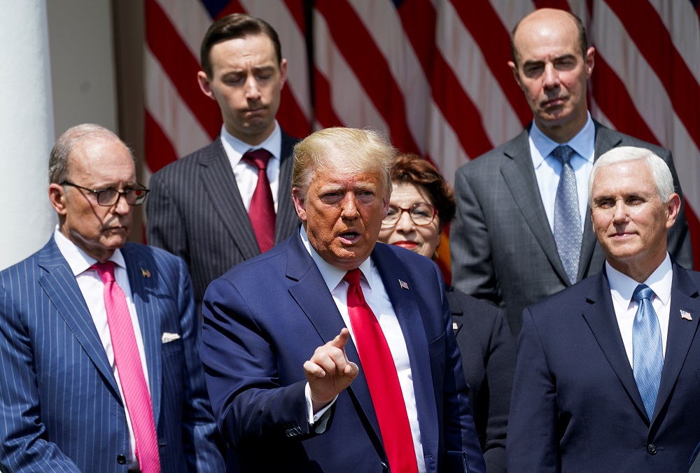 US President Donald Trump talks about a US jobs report amid the coronavirus disease pandemic as members of his administration listen in the Rose Garden at the White House in Washington June 5, 2020. u00e2u20acu201d Reuters pic