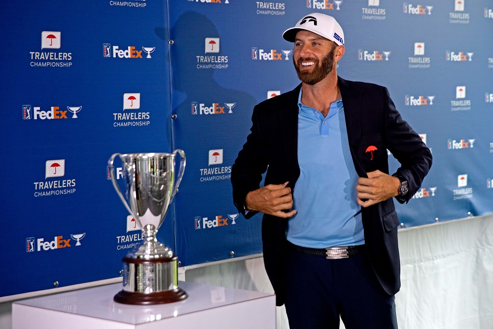 Dustin Johnson poses with the trophy after winning the Travellers Championship golf tournament at TPC River Highlands, Cromwell June 28, 2020. u00e2u20acu201d Picture by Bill Streicher-USA TODAY Sports via Reuters