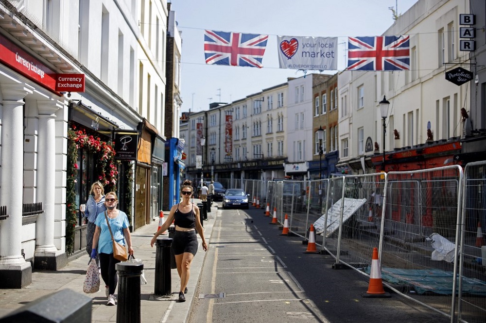 People walk past closed shops in Portobello Market in west London on June 1, 2020. u00e2u20acu201d AFP pic