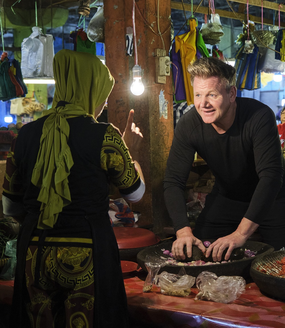 Ramsay visited an Indonesian wet market to learn how to make rendang paste from a local trader. — Picture courtesy of National Geographic