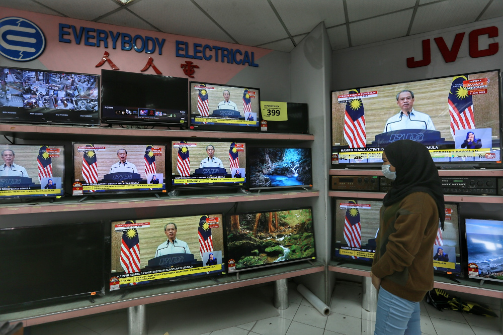 A live broadcast of Prime Minister Tan Sri Muhyiddin Yassin on the recovery movement control order is seen on a television in Kuala Lumpur June 7, 2020. u00e2u20acu2022 Picture by Ahmad Zamzahuri