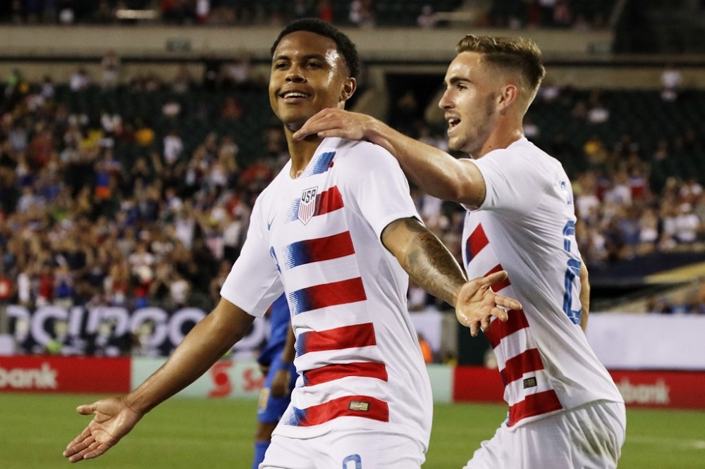 USA's Tyler Boyd (right) congratulating his teammate Weston McKennie after McKennie scored a goal during the Concacaf Gold Cup quarterfinal football match against Curacao in Philadelphia July 1, 2019. u00e2u20acu201d AFP pic