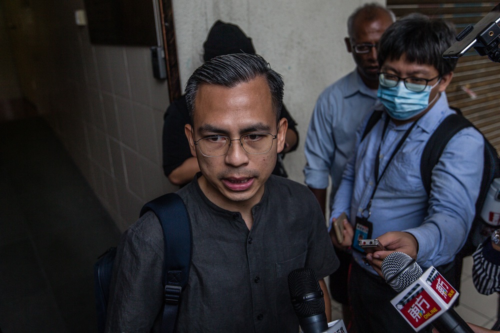 PKR communications director Fahmi Fadzil speaks to the press after a meeting with fellow Pakatan Harapan leaders in Petaling Jaya June 12, 2020. — Picture by Firdaus Latif 