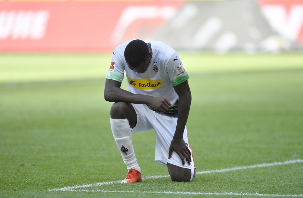 Moenchengladbach's French forward Marcus Thuram reacts after scoring during the German first division Bundesliga football match against Union Berlin in Moenchengladbach, western Germany May 31, 2020. u00e2u20acu201d AFP pic