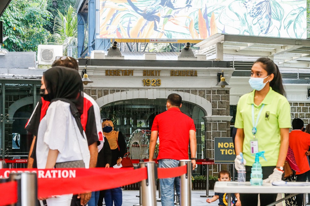 Local tourists are seen waiting in line to buy tickets at the entrance of Penang Hill June 15, 2020. u00e2u20acu201d Picture by Sayuti Zainudin