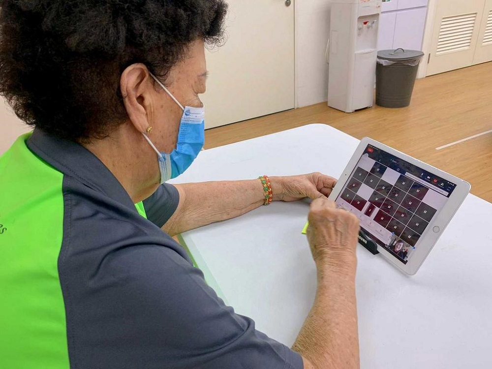 Elders get to chat and do online activities with DBS bank volunteers through video calls at senior activity centres run by Lions Befrienders. u00e2u20acu201d TODAY pic