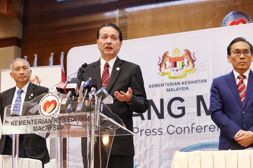 Health director-general Datuk Dr Noor Hisham Abdullah (centre) speaks at a press conference in Putrajaya June 24, 2020. u00e2u20acu201d Picture by Choo Choy May