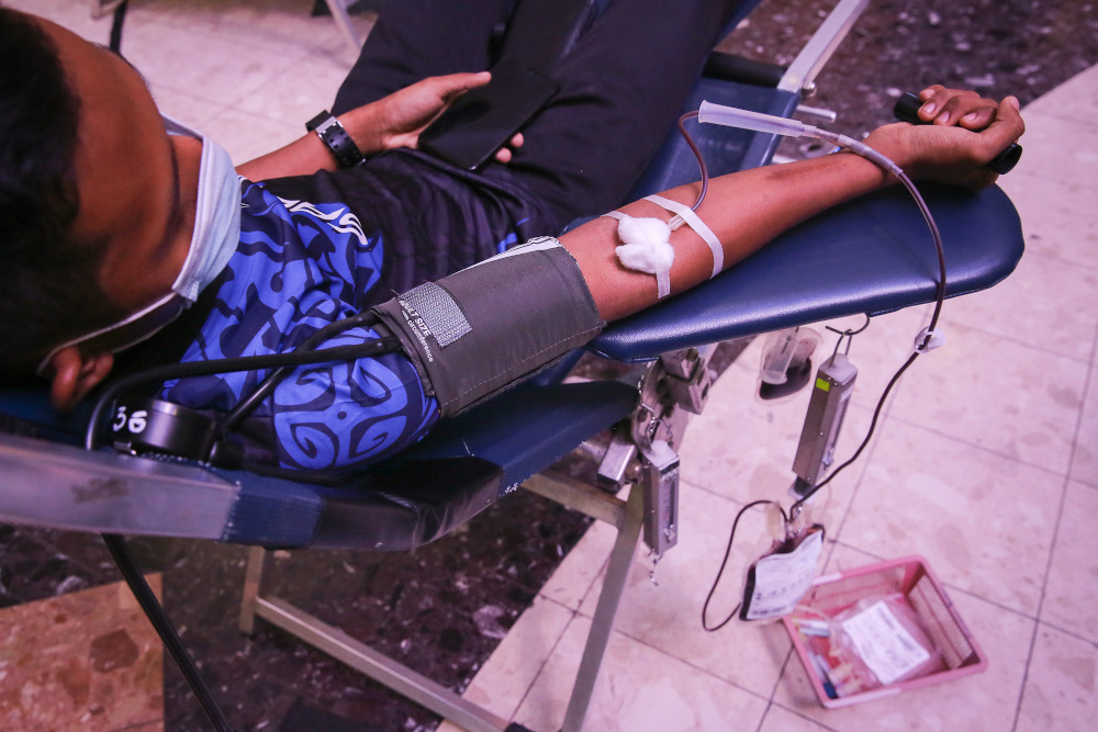 People donate blood during the u00e2u20acu02dcBlood Hero Dayu00e2u20acu2122 programme in Klang June 28, 2020. u00e2u20acu201d Picture by Yusof Mat Isa