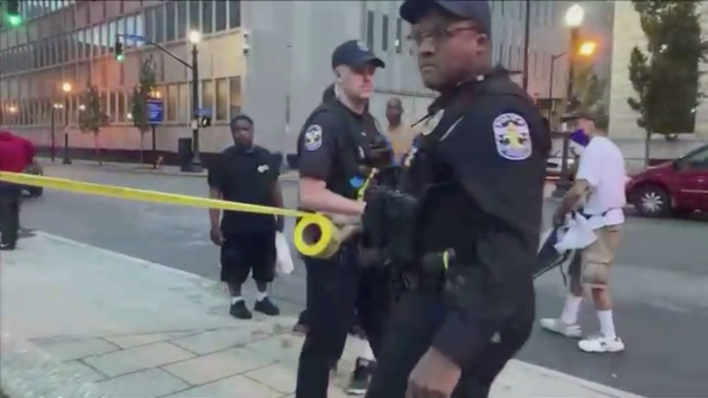 Man arrested over fatal shooting in Kentucky park at centre of protests ...