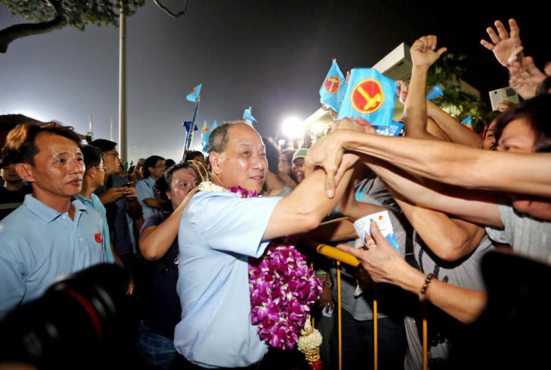 Low Thia Khiang shaking hands with residents at the end of the Workers' Party rally at Bedok Stadium September 9, 2015. u00e2u20acu201d TODAY pic