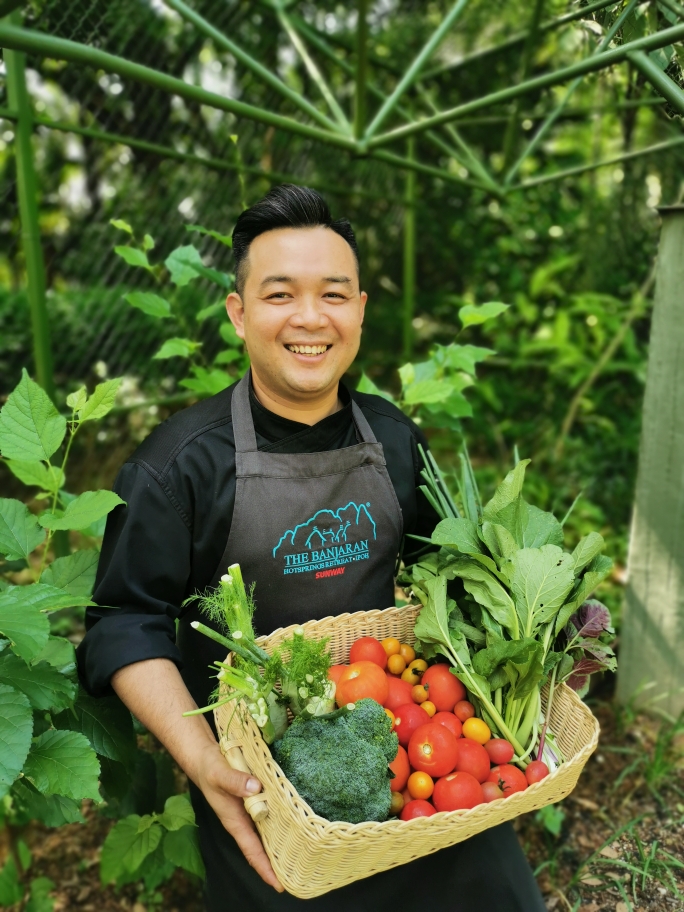 Chef Boon with fresh produce from the organic gardens. — Picture courtesy of Sunway Group