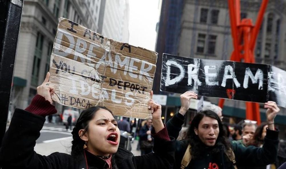 File picture shows activists and DACA recipients marching up Broadway during the start of their u00e2u20acu02dcWalk to Stay Home,u00e2u20acu2122 a five-day 250-mile walk from New York to Washington DC, to demand that Congress pass a Clean Dream Act, in Manhattan, New York, Febru