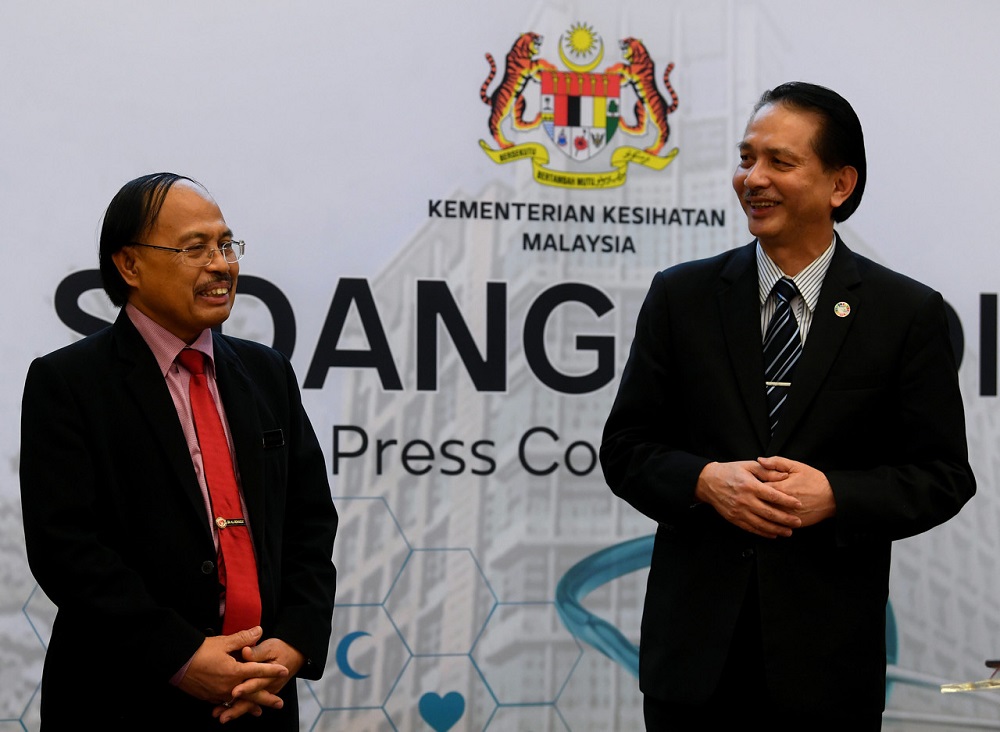 Health deputy director-general (Medical) Datuk Dr Rohaizat Yon (left) and Health director-general Datuk Dr Noor Hisham Abdullah during a press conference in Putrajaya June 10, 2020. u00e2u20acu201d Bernama pic