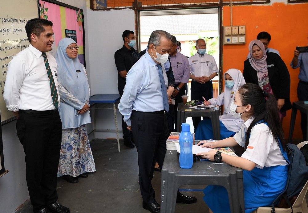 Prime Minister Tan Sri Muhyiddin Yassin speaks to students during his visit to Sekolah Menengah Kebangsaan Datok Lokman in Jalan Kampung Pandan, Kuala Lumpur June 24, 2020. u00e2u20acu201d Bernama pic